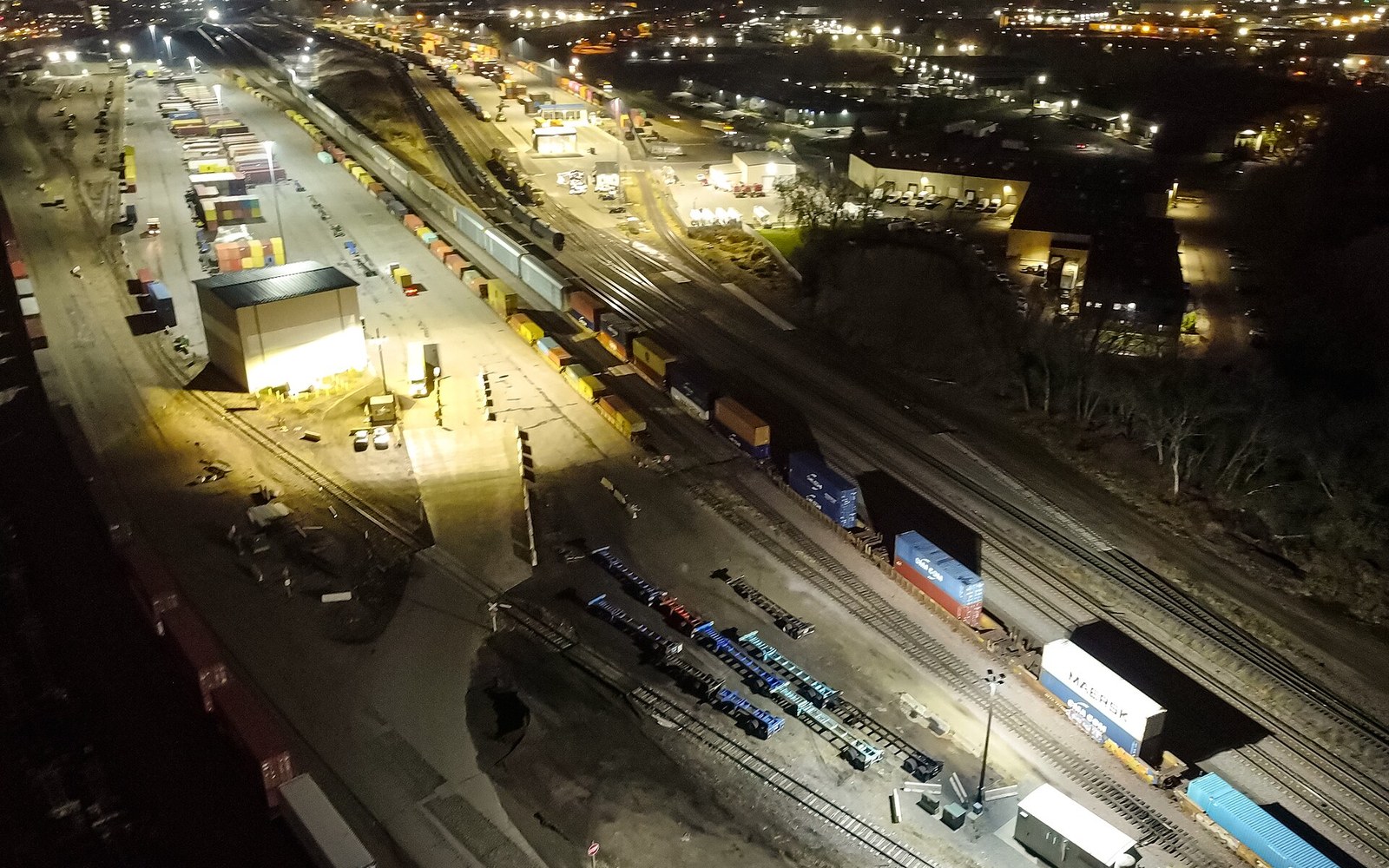 Stacked containers in a terminal yard seen from height